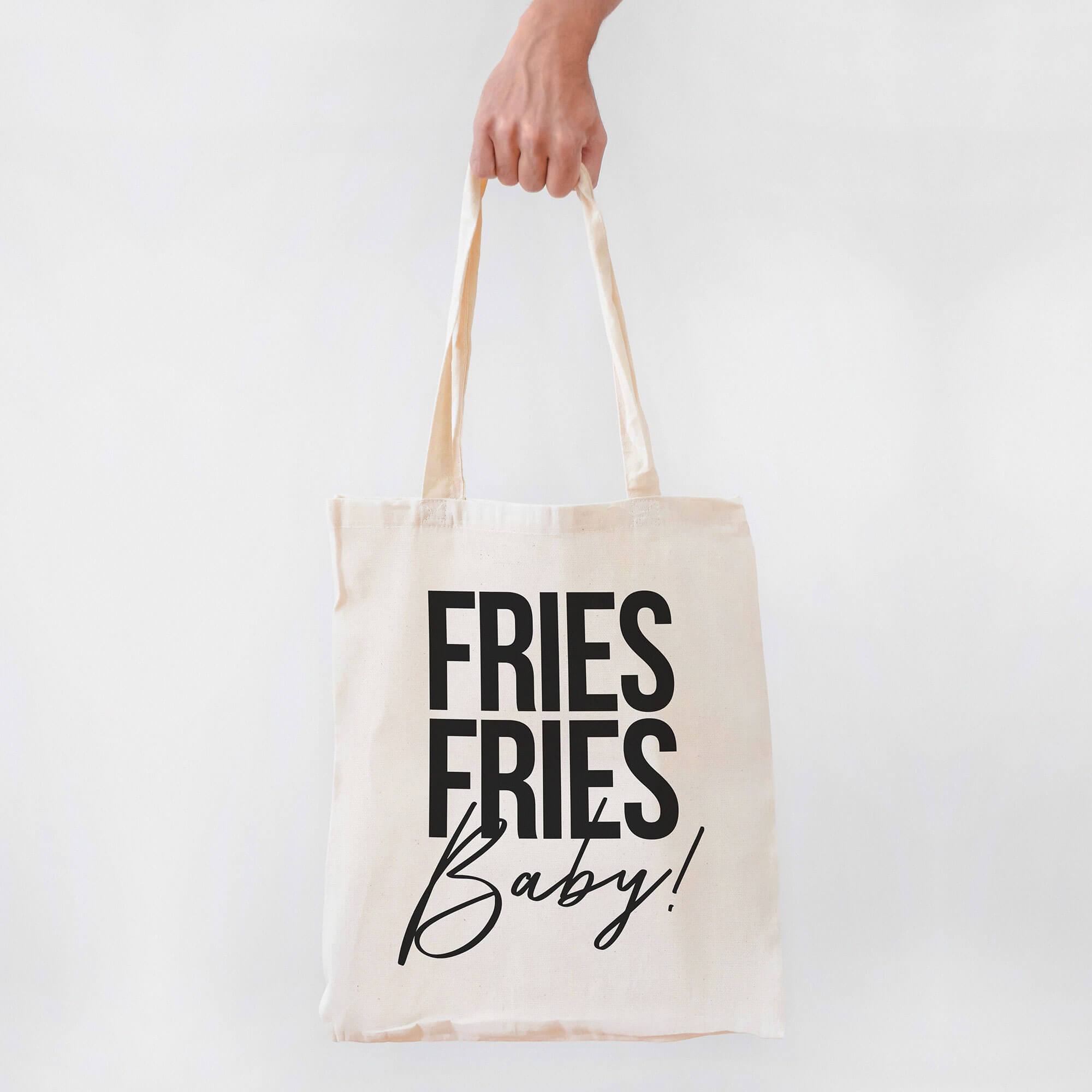 Beige Tragetasche mit langen Henkeln und schwarzem "Fries Fries Baby"-Druck