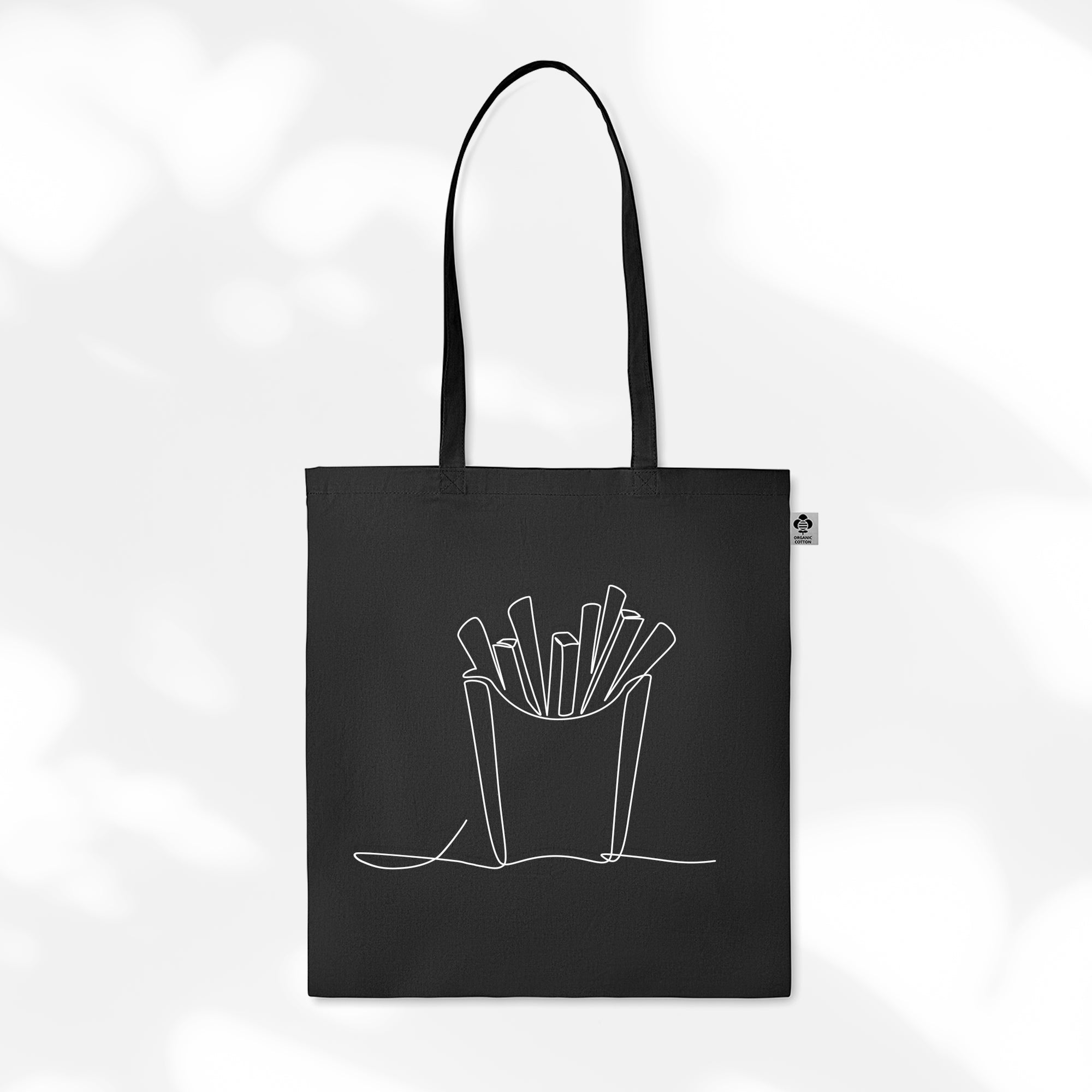 Schwarze Tragetasche mit weißem gezeichneten Motiv einer Pommestüte